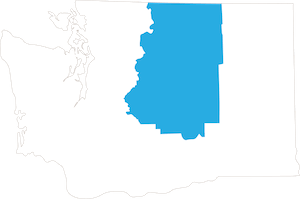 A white map of Washington with the Trails and Lakes region highlighted.