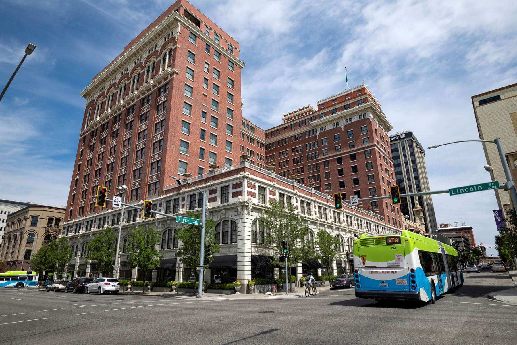 Bus traveling past buildings in Spokane, Washington