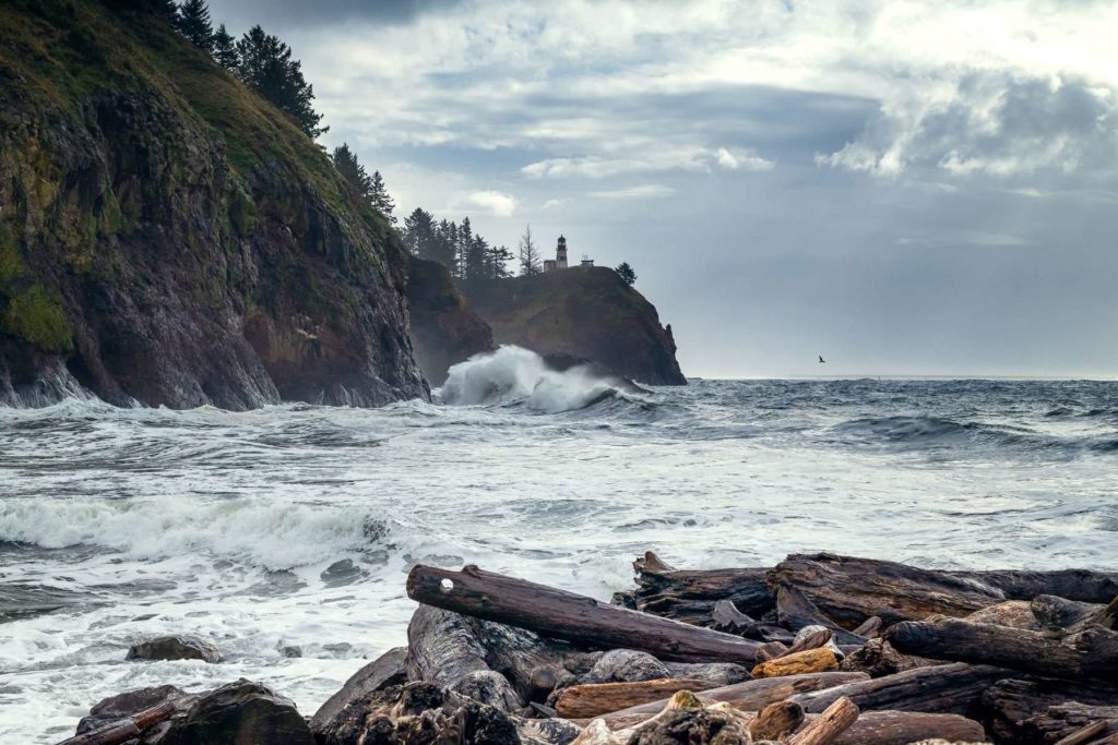 Storm watching in Washington as waves crash against the cliffs