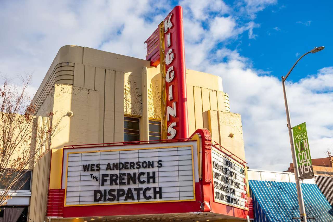 Exterior view of Kiggins Theatre in Vancouver Washington with a sign that reads "Wes Anderson's The French Dispatch."