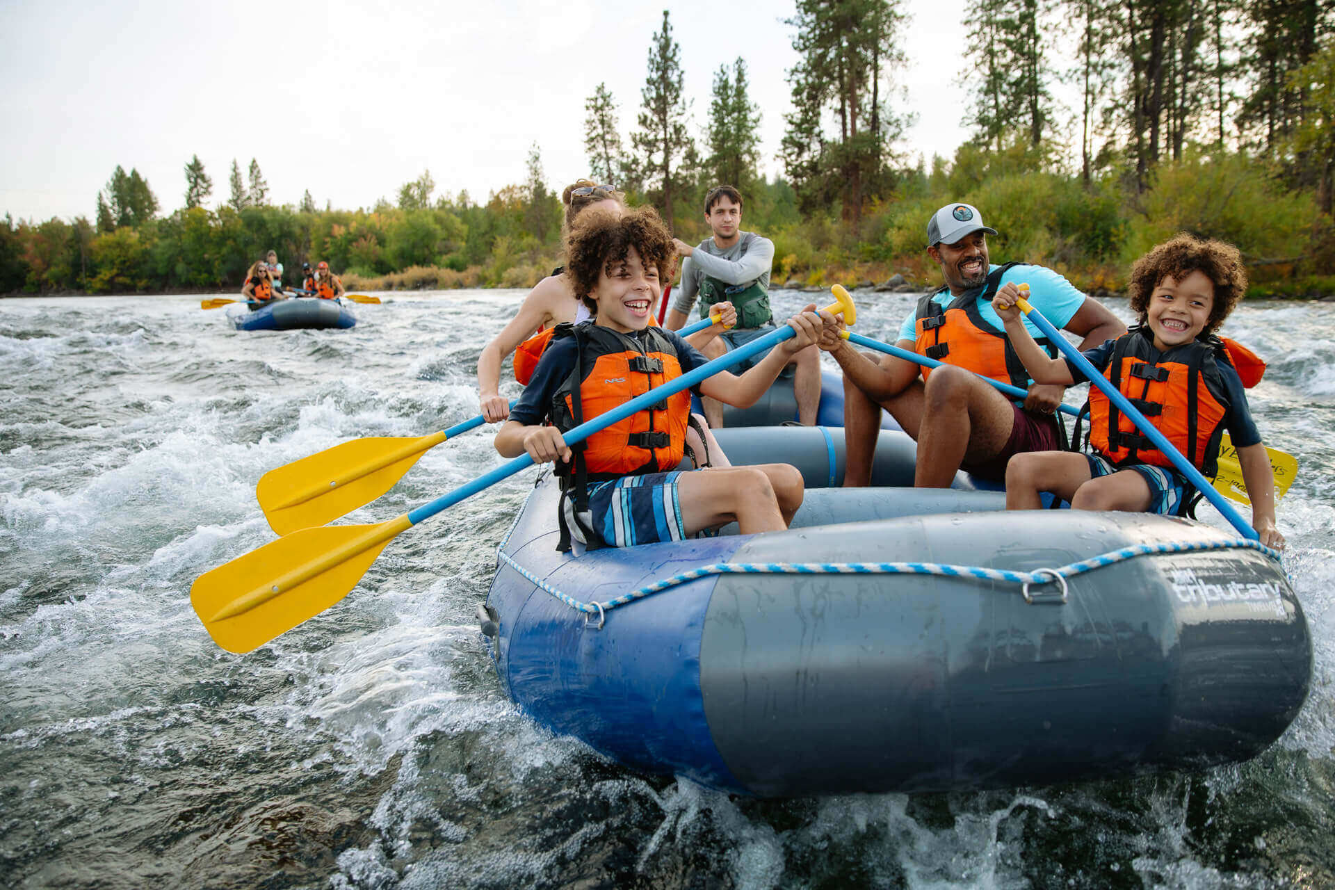 Things to do with kids in Washington: A family rafts a river near Spokane.