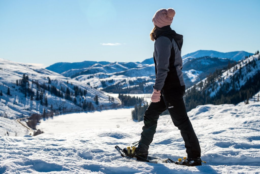 A woman goes snowshoeing in washington