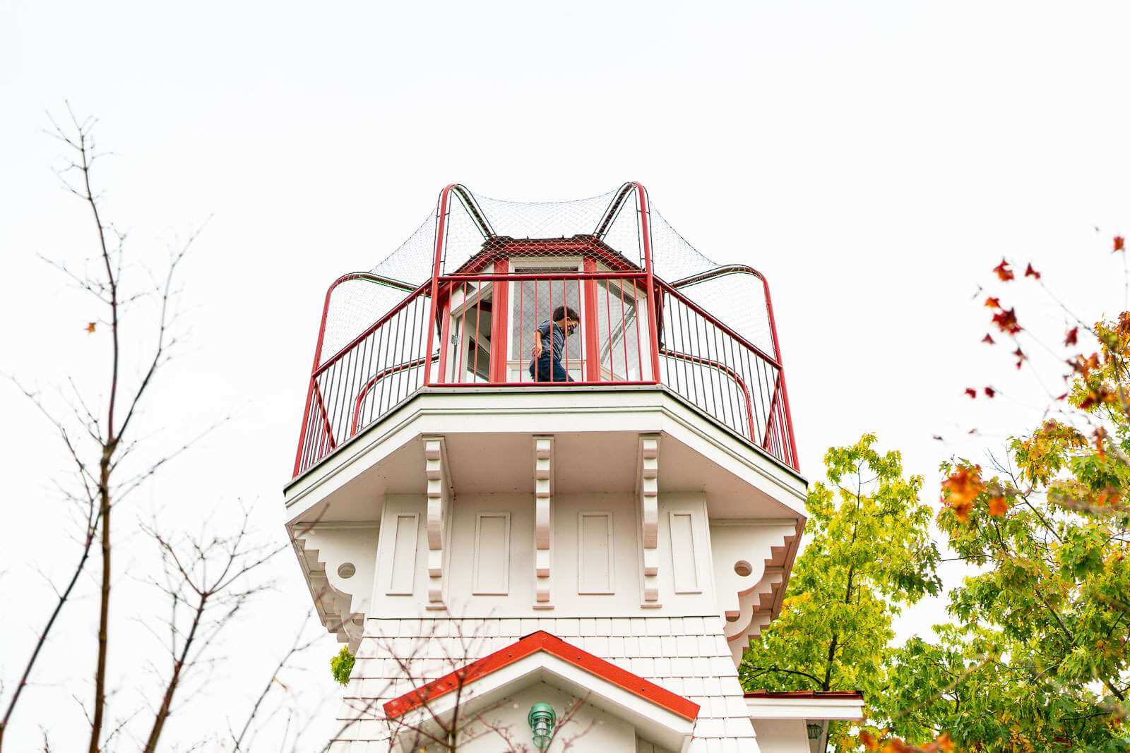A child plays in a tower structure
