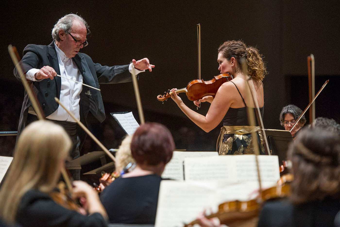 A man conducts an orchestra in the Walla Walla Symphony