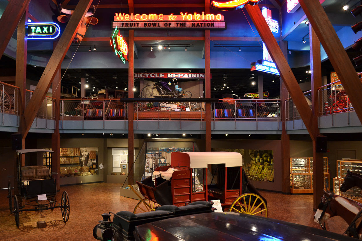 Old carriages are seen inside the Yakima Valley Museum.