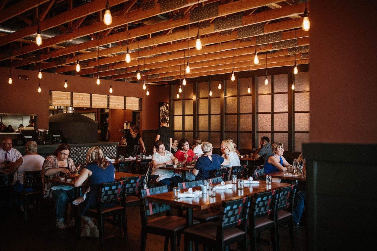 People dine inside Provisions Restaurant and Market.