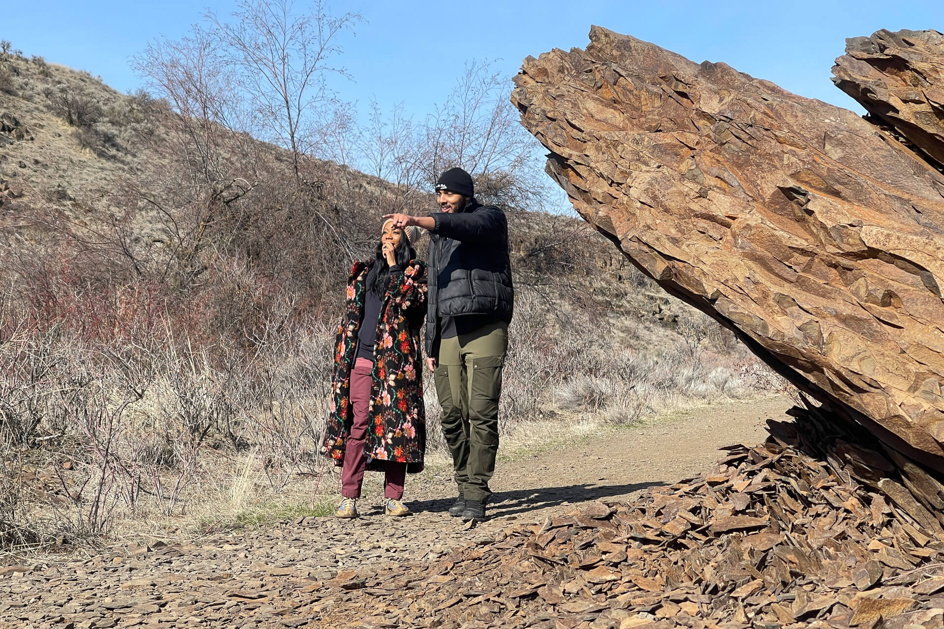 Anthony and Marlie love stand on a trail in the Yakima Valley, one of the destinations they enjoyed visiting as Black travelers in Washington