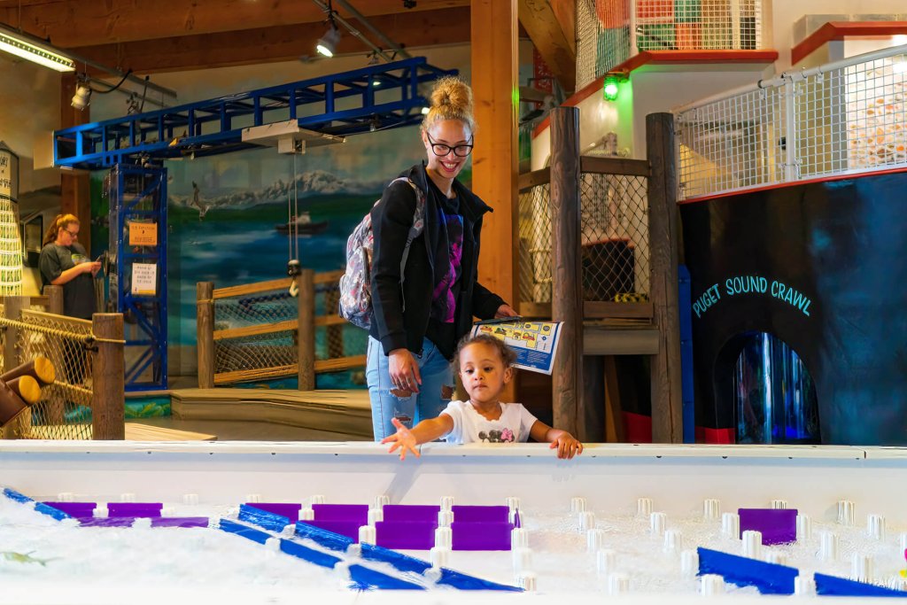 A mother and child play at the Hands on Children's Museum, one the the best Kid-Friendly Museums in Washington