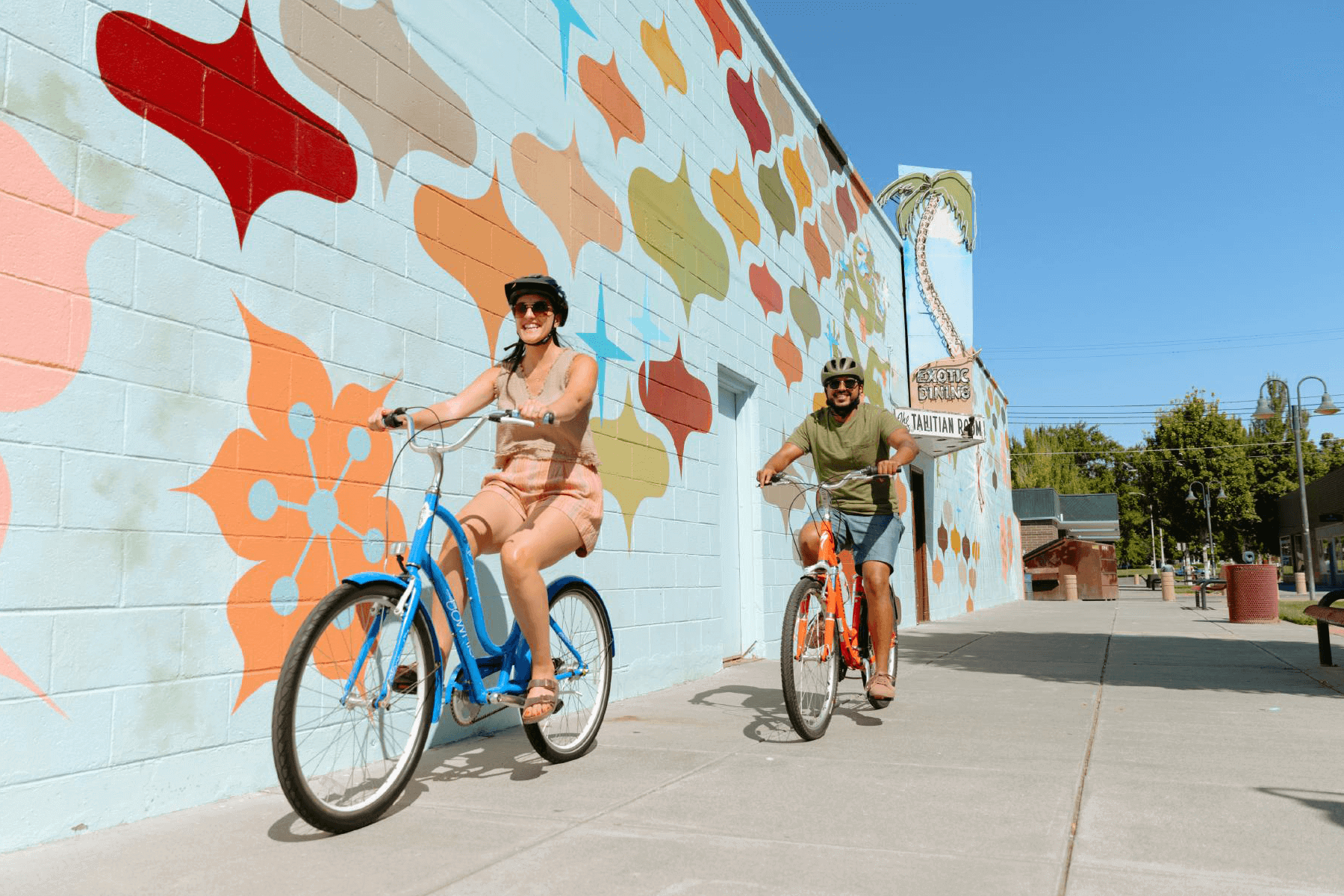 A couple rides bikes in Richland, WA