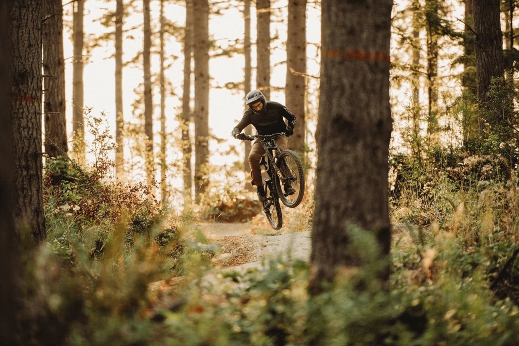 Mountain biker in Port Gamble Forest Heritage Park. 