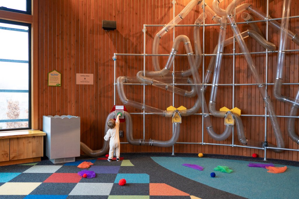 A young child plays at the Hands On Childrens Museum, one of many things to do with kids in Olympia