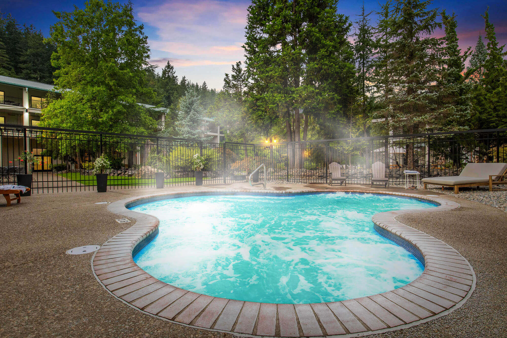 A steaming outdoor hot spring at Courtesy of Bonneville Hot Springs Resort & Spa