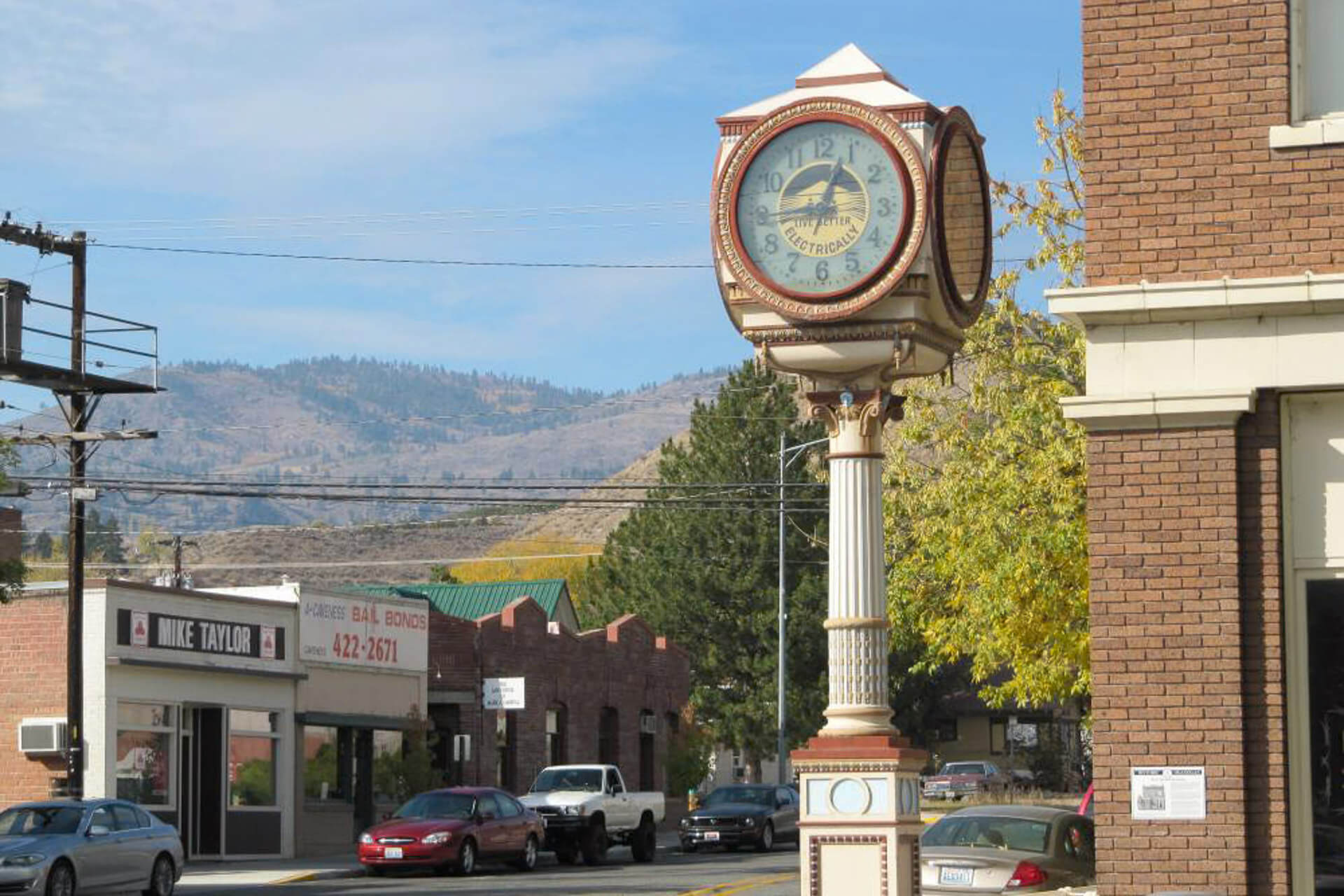 A old clock in the downtown of a small town