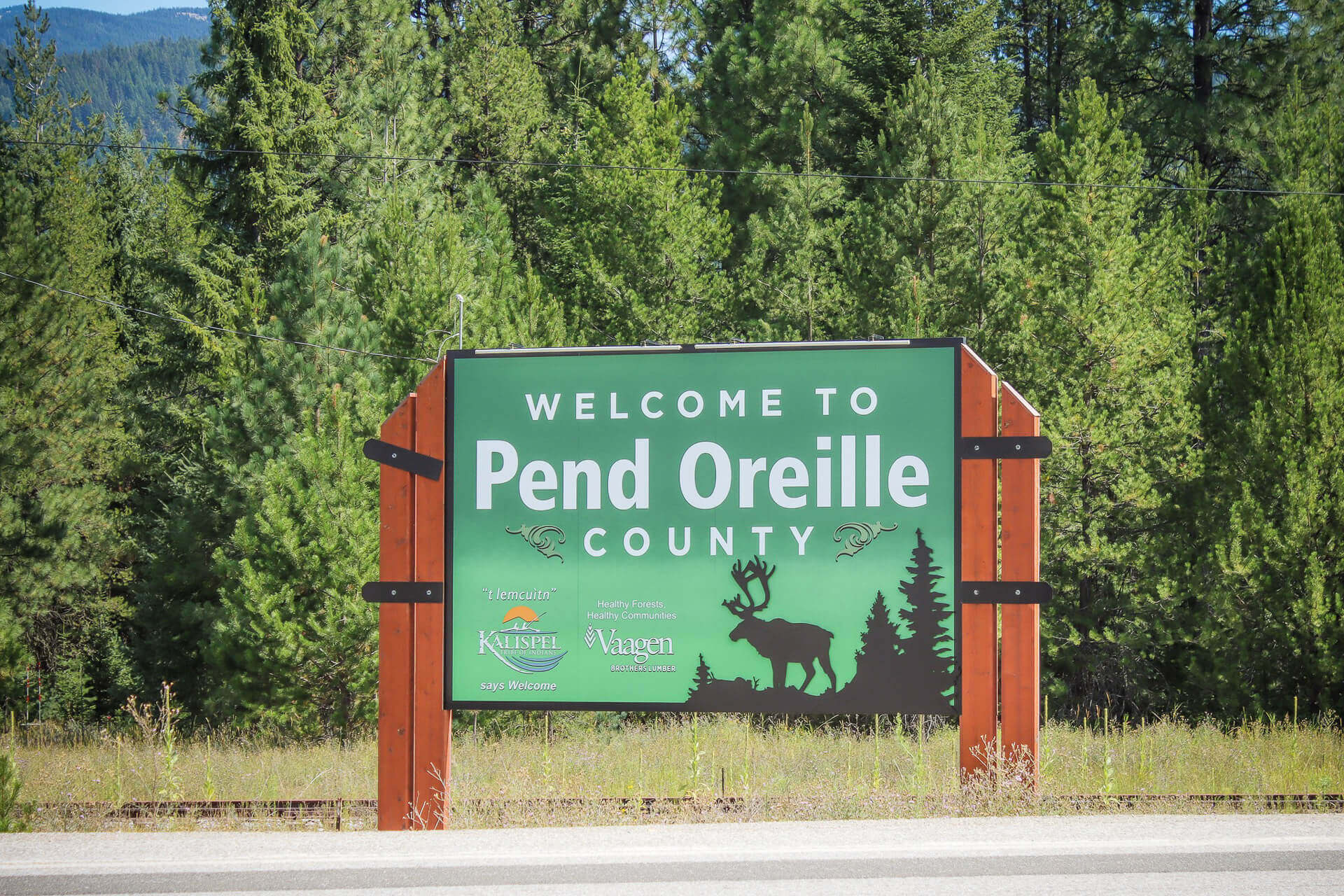 A welcome to Pend Oreille County sign along a scenic byway
