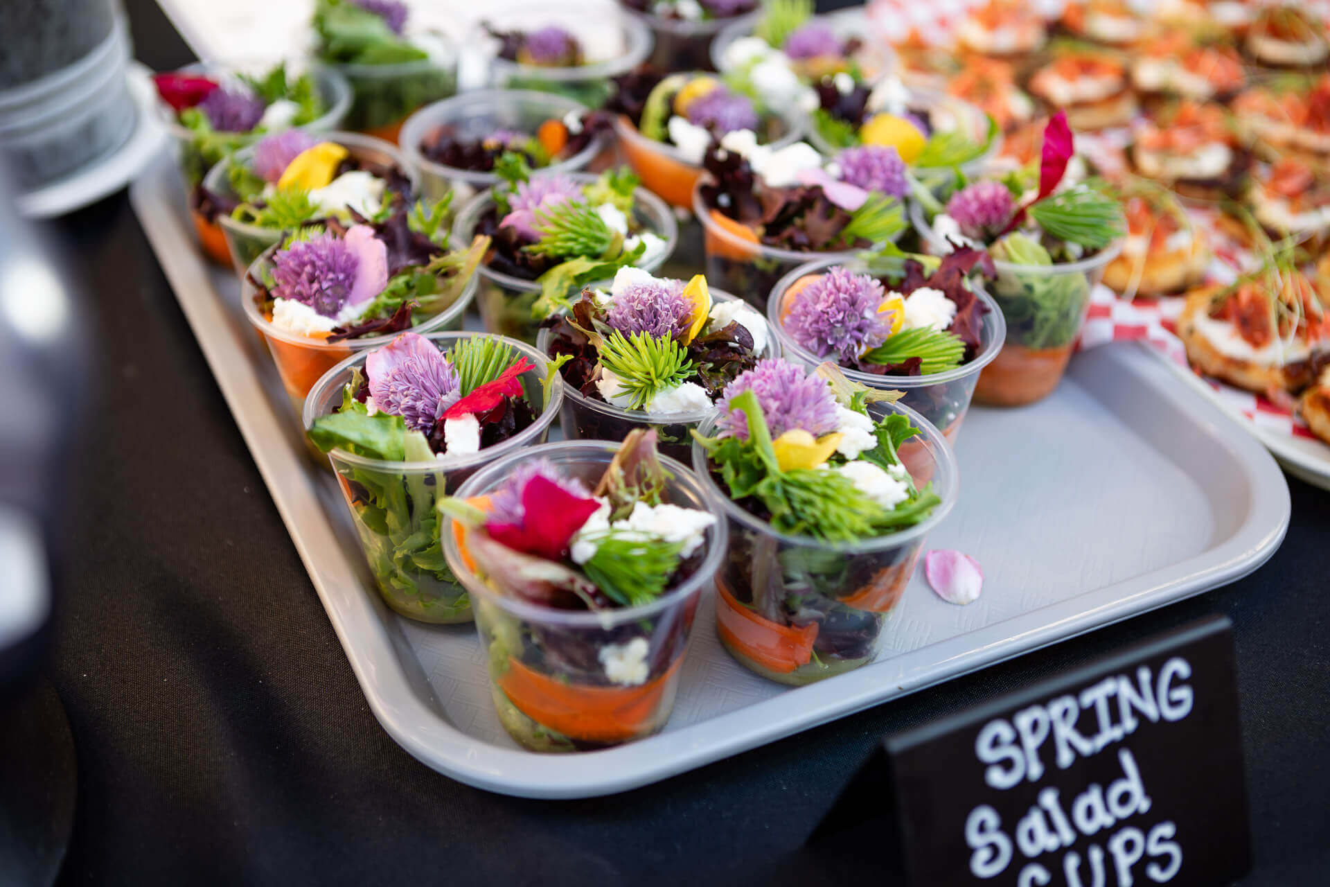Small cups of salad are offered at The Scale House Market
